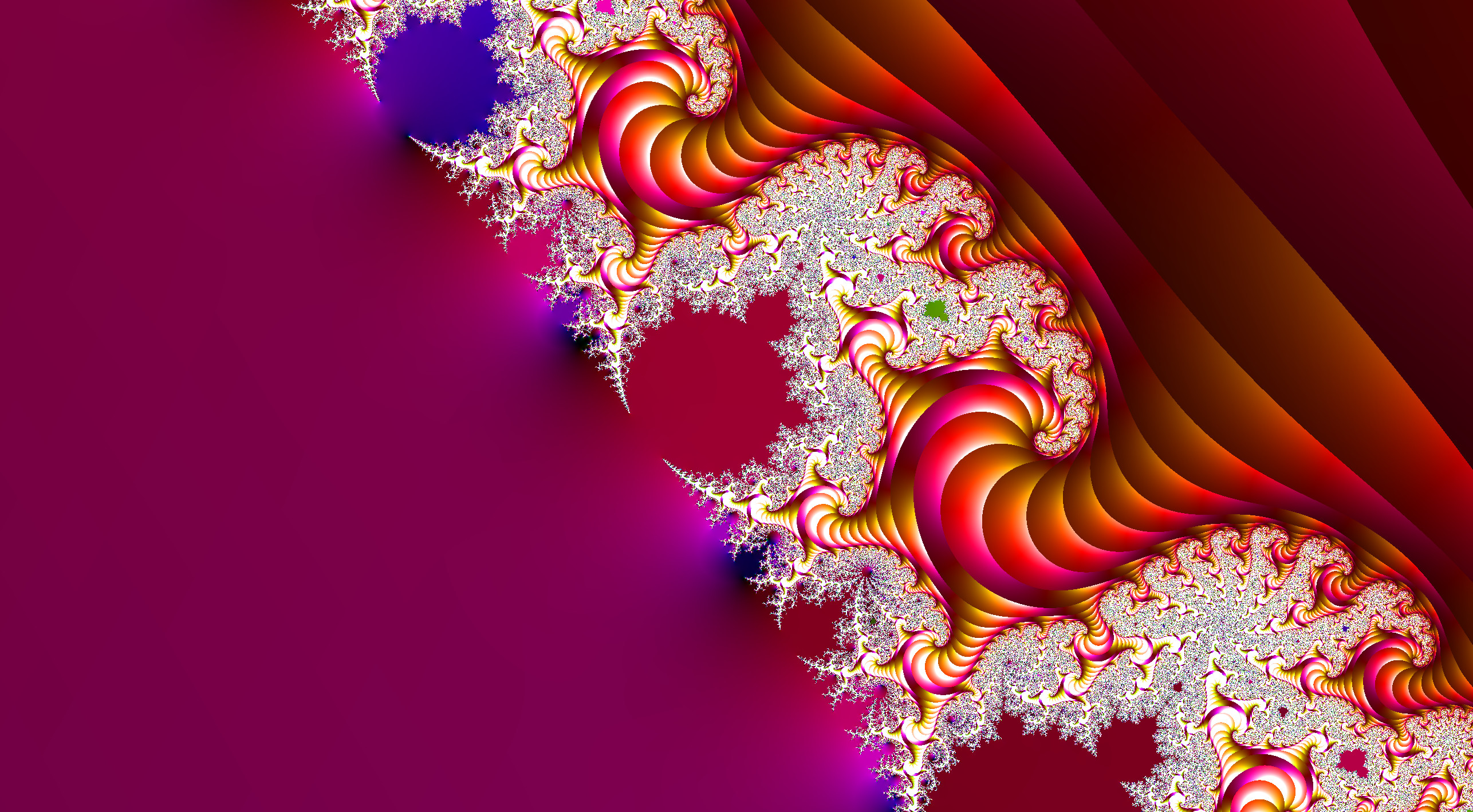 Curly pink-orange seahorse fractal from the Mandelbrot set.